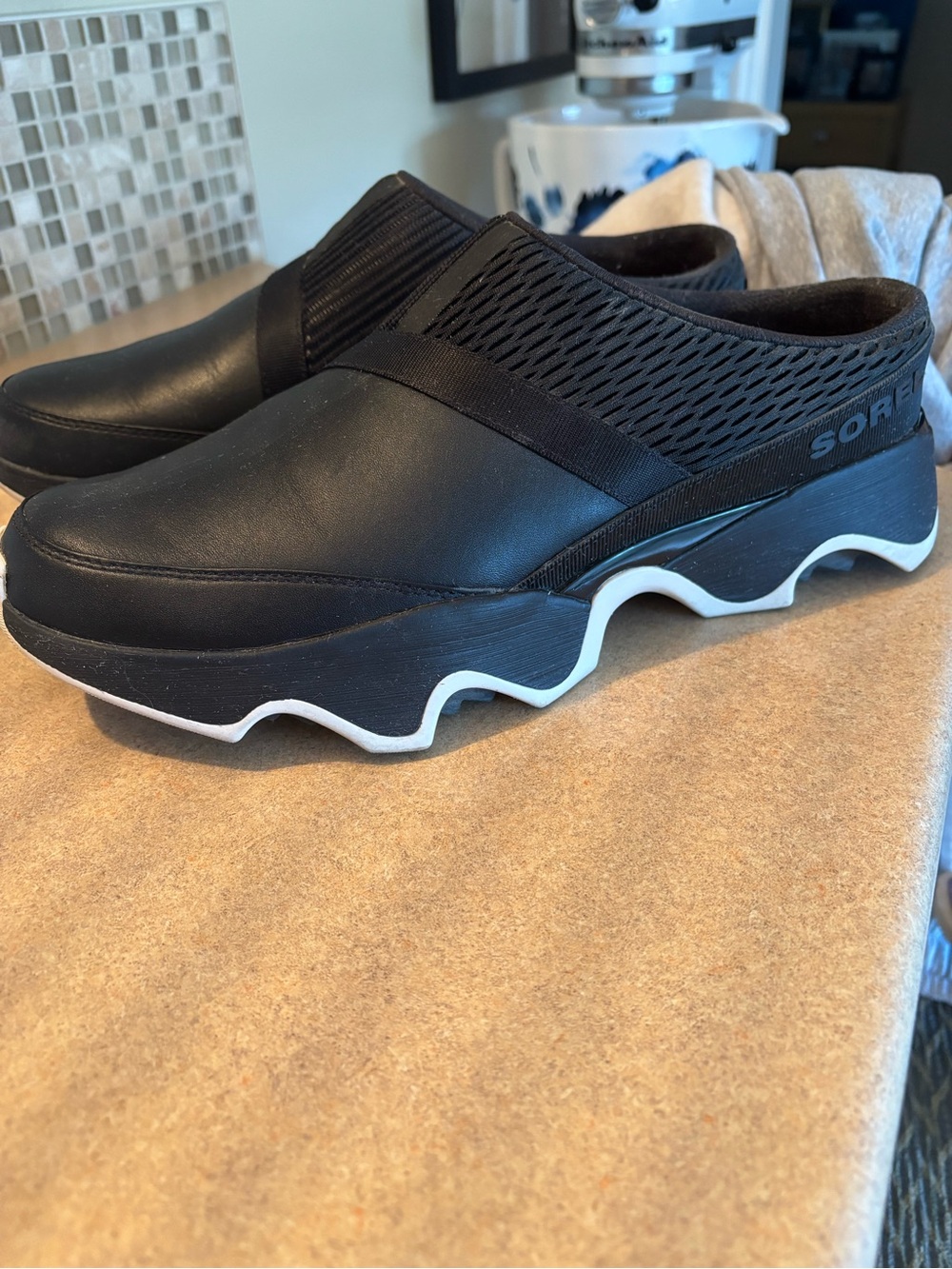Sorel Black Slip-On Mesh & Leather Clog with White Wave Sole